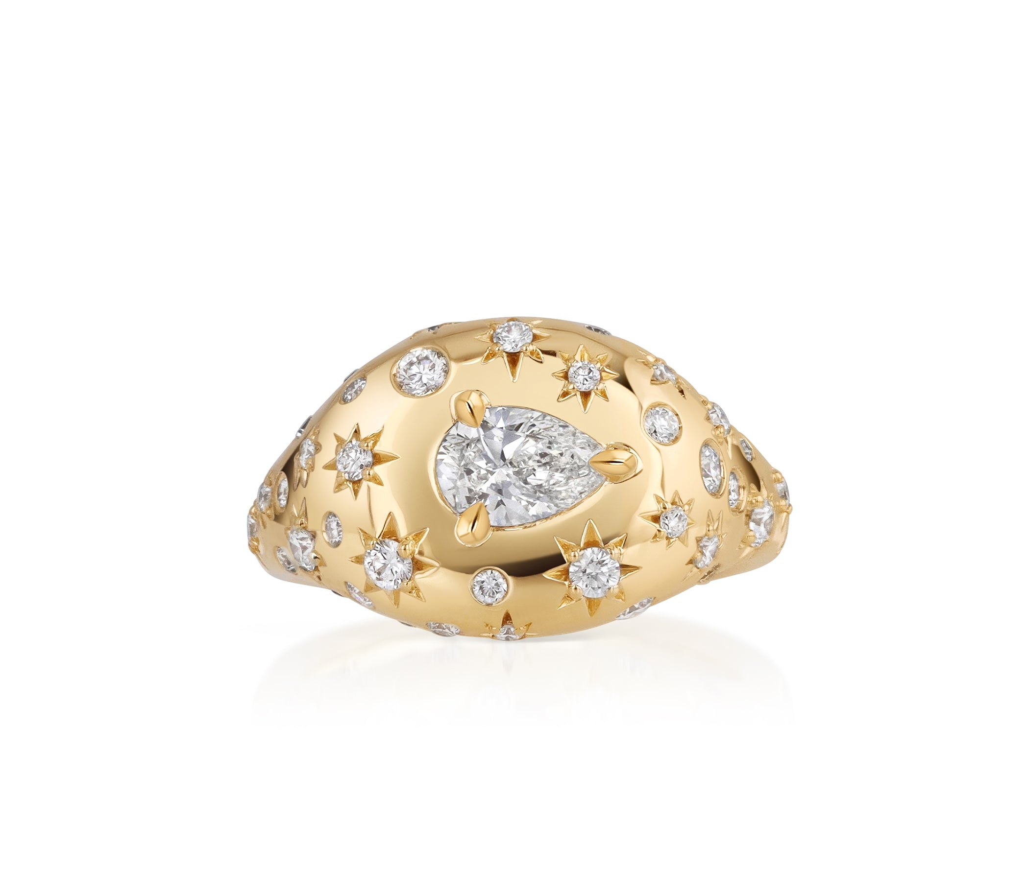 Small 18k yellow gold domed signet ring with a central east-west pear-shaped natural diamond and scattered star-set and burnished diamond accents.