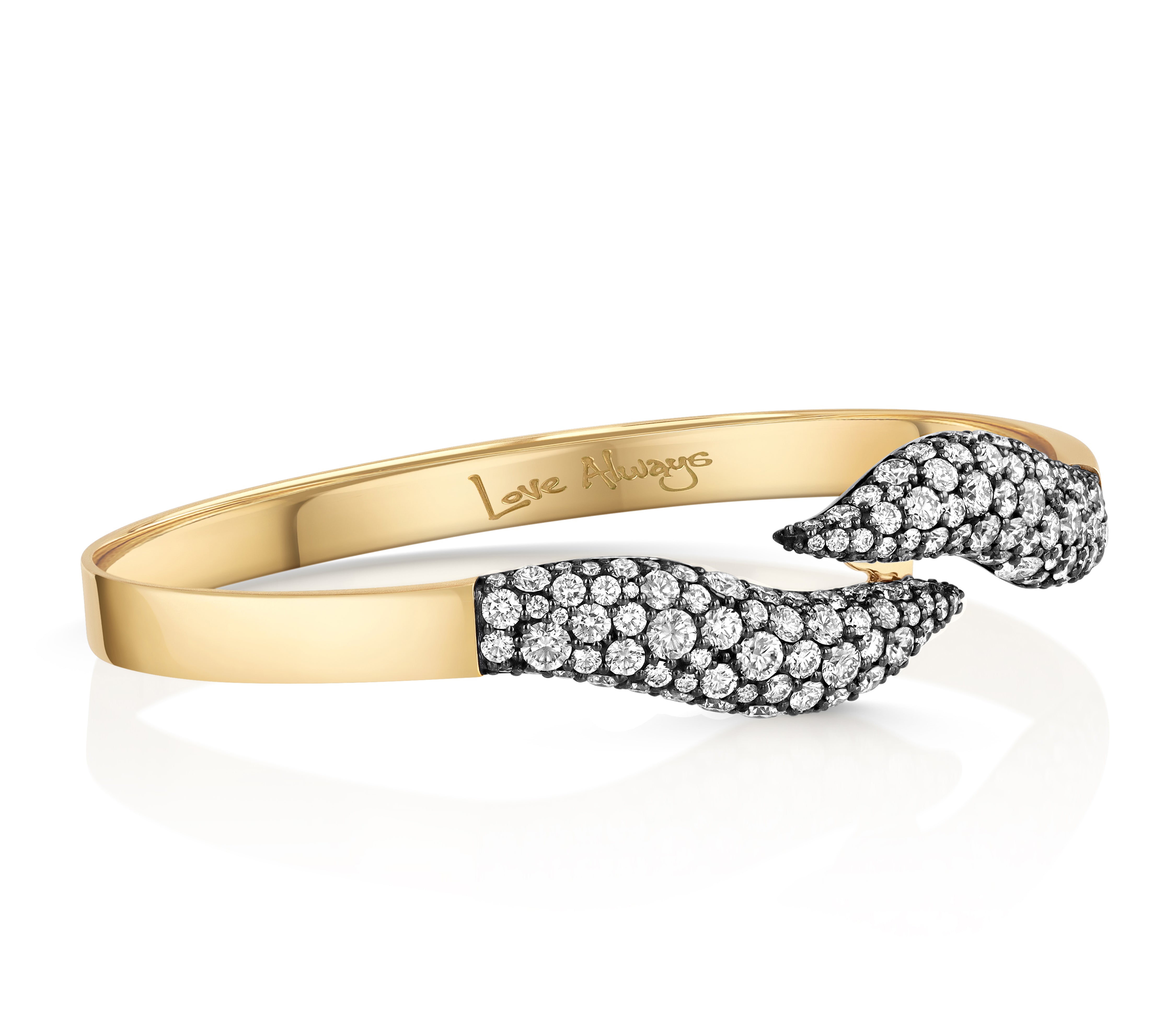 Sideview of the Diamond Dancer Double Pave Bracelet in 18k yellow gold with colorless diamond pave set against black rhodium.