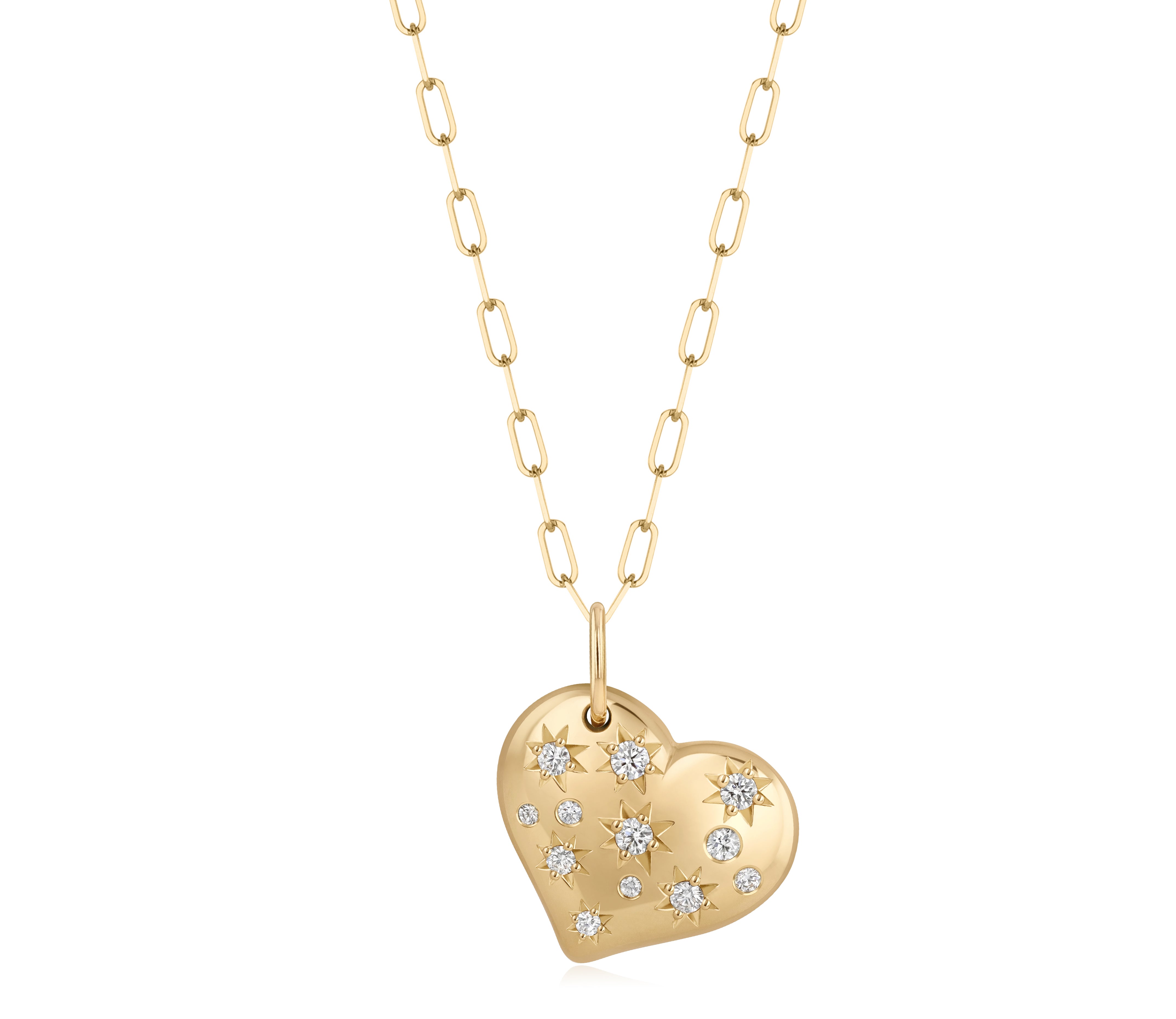 18k yellow gold paperclip chain necklace with a heart shaped pendant and scattered star set and burnished natural diamond accents