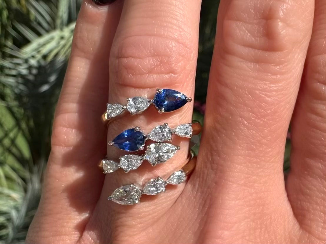 Pear Shape Diamond and Sapphire Graduated Crossover Ring