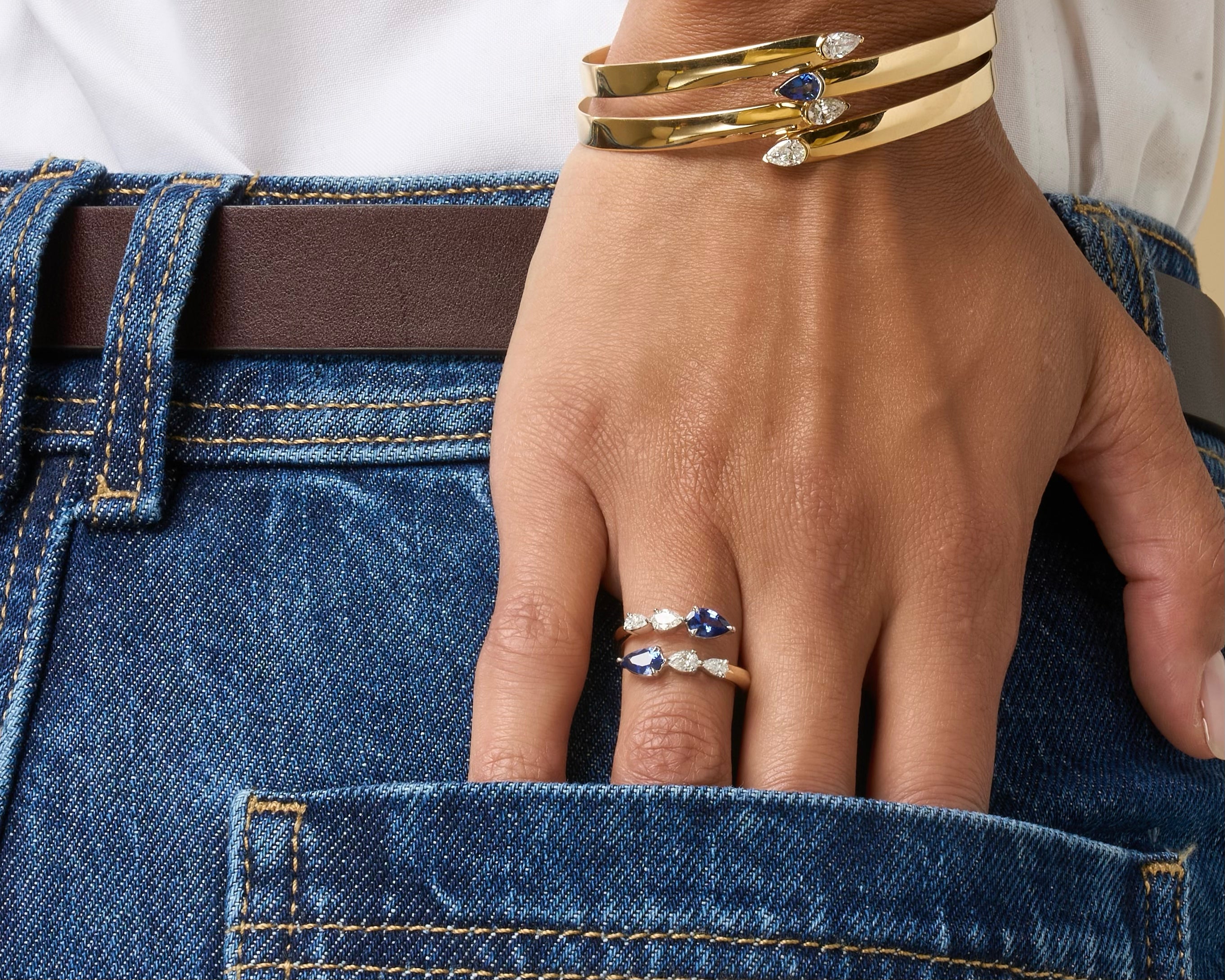 Pear Shape Diamond and Sapphire Graduated Crossover Ring