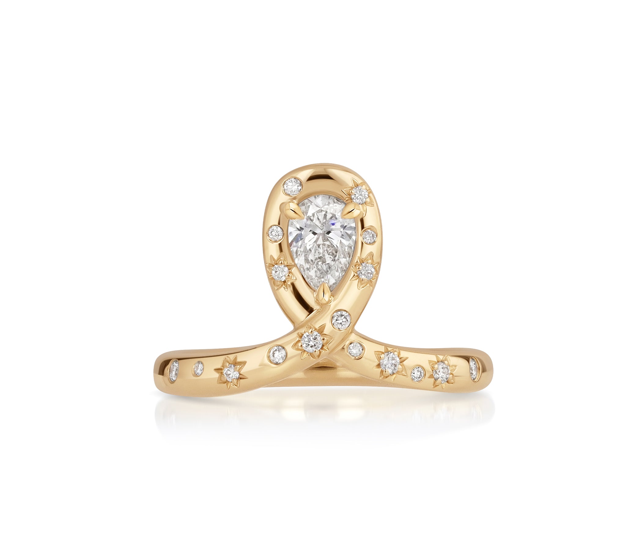 18k yellow gold loop ring with a central pear-shaped natural diamond and scattered star-set and burnished diamond accents.