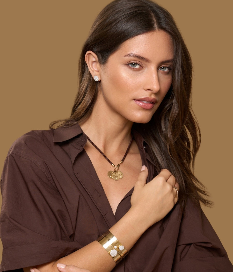 14k yellow gold personalized name tag necklaces layered with engraved pendants and diamond jewelry