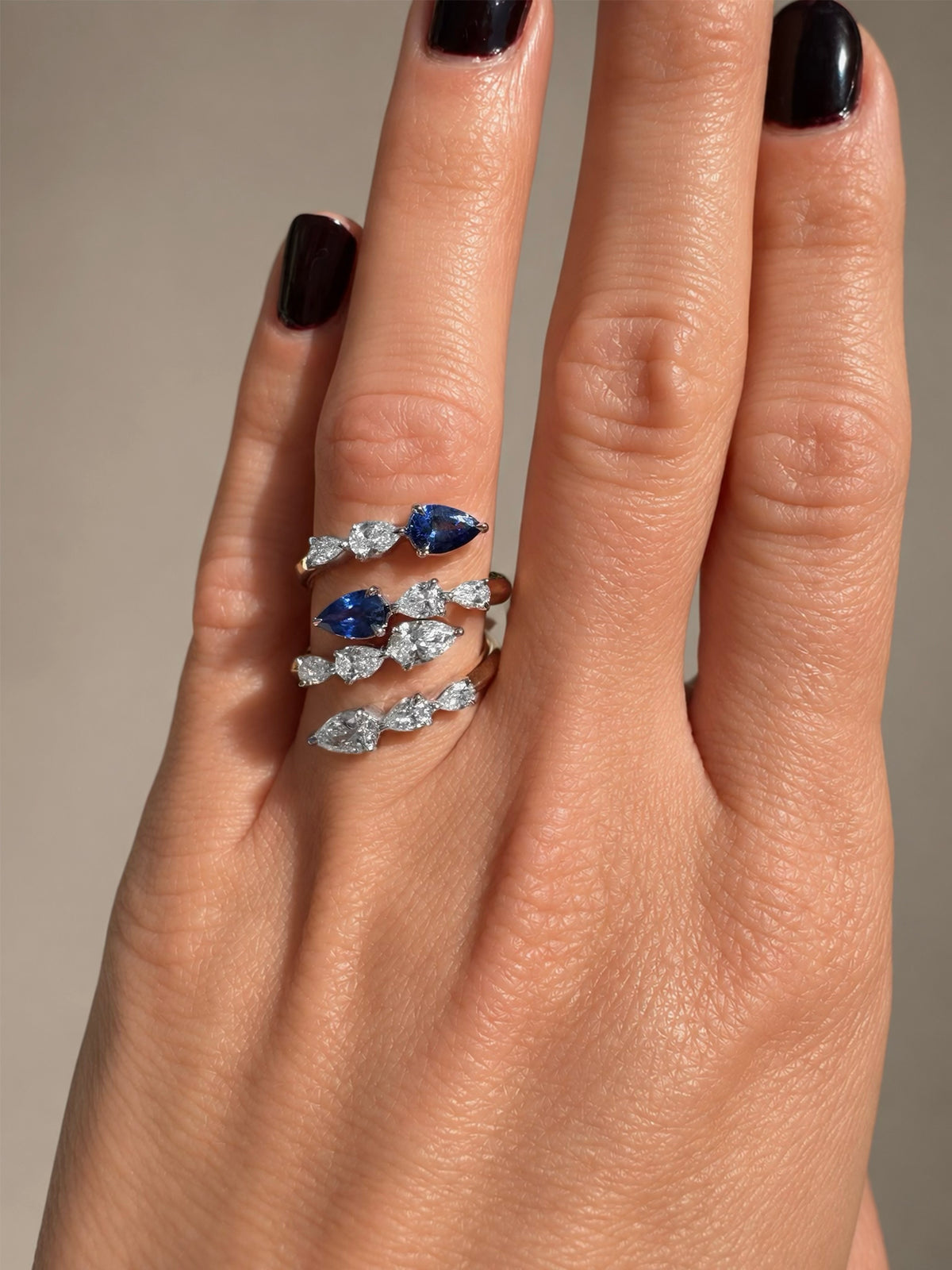Pear Shape Diamond Graduated Crossover Ring
