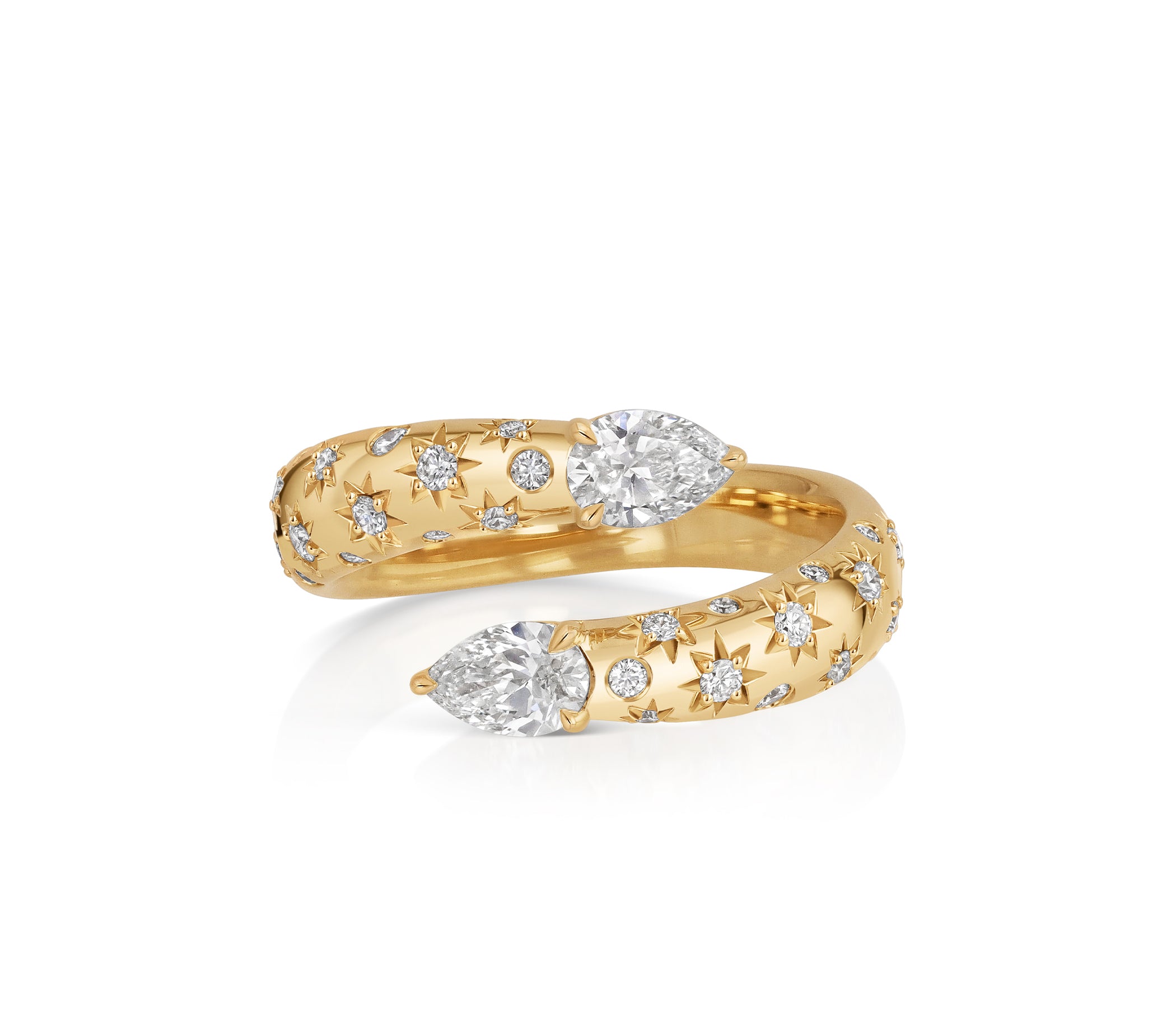 18k yellow gold bypass bracelet with two pear-shaped natural diamonds and scattered star-set and burnished diamond accents.