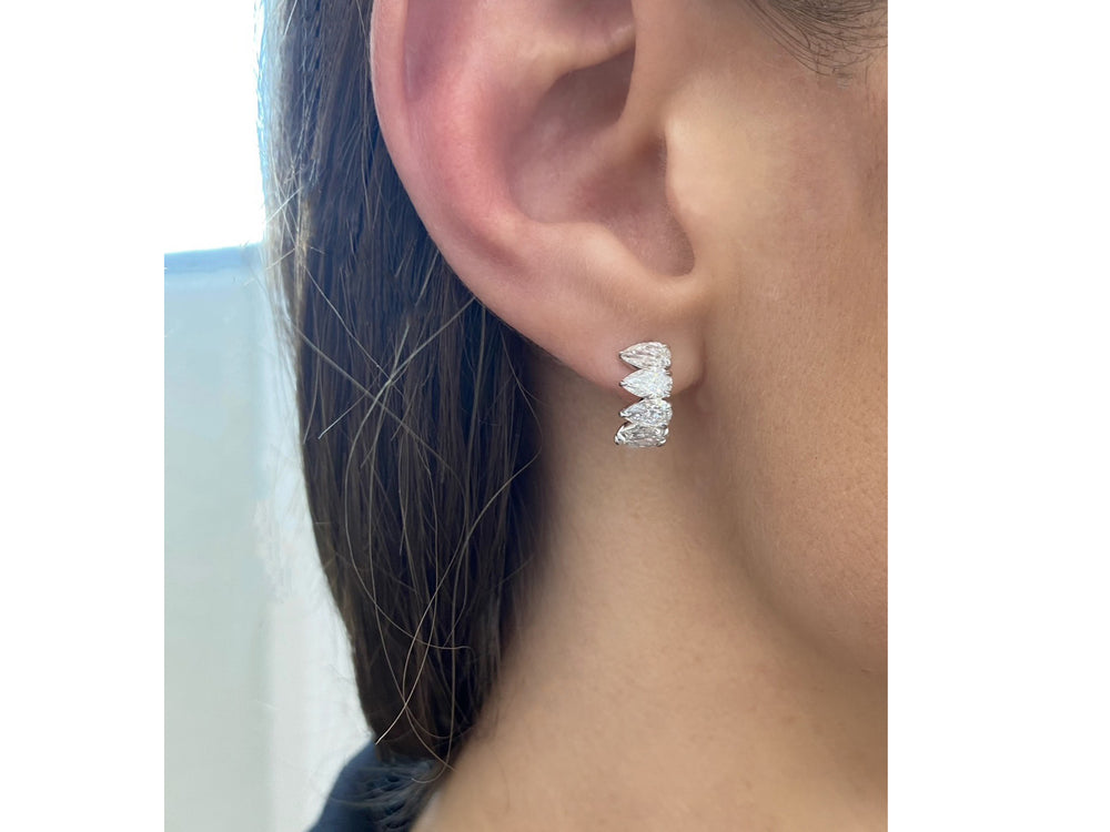 
                
                    Load image into Gallery viewer, Pear Shape Mini Hoop Earrings
                
            